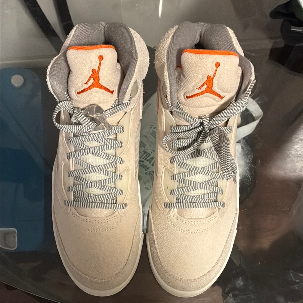Jordan Cream and Orange Sneakers Iconic Design